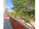 Balcony with an orange wall, a metal railing, and street views at 475 2Nd N St # 201, St Petersburg, FL 33701