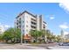Modern condo building with inviting storefront, balconies, and street appeal in a bustling neighborhood at 475 2Nd N St # 201, St Petersburg, FL 33701