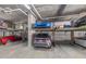 Underground garage with a car stacking system and a collection of parked cars at 475 2Nd N St # 201, St Petersburg, FL 33701