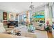 Combined Living and Dining area with access to the balcony via sliding glass door and great natural light at 475 2Nd N St # 201, St Petersburg, FL 33701