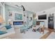 Comfortable living room with a sleek fireplace, contemporary furniture, and a ceiling fan at 475 2Nd N St # 201, St Petersburg, FL 33701
