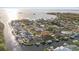 Waterfront neighborhood with docks and boats lining the canals, offering easy access to the open water at 504 Driftwood E Dr, Palm Harbor, FL 34683