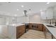 This spacious kitchen boasts modern appliances, sleek countertops, and ample cabinet space for all your culinary needs at 504 Driftwood E Dr, Palm Harbor, FL 34683