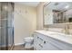 Modern bathroom with double sinks and glass-enclosed shower at 6154 36Th N Ave, St Petersburg, FL 33710