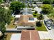 A drone shot of the home, yard and neighborhood at 6311 Seabreeze Dr, Port Richey, FL 34668