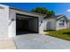 Attached two-car garage at 6311 Seabreeze Dr, Port Richey, FL 34668