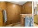 Bathroom features large shower with brown tile surround and white accents at 6718 Watson Rd, Riverview, FL 33578