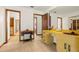 Bright bathroom with walk-in closets and decorative tiled floor at 6718 Watson Rd, Riverview, FL 33578