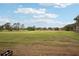 Expansive golf course view with lush green fairways, offering a picturesque and enjoyable golfing experience at 7094 Fairway Bend Cir # 7094, Sarasota, FL 34243