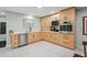 Modern kitchen with sleek countertops, stainless steel appliances, and ample cabinet space at 7094 Fairway Bend Cir # 7094, Sarasota, FL 34243