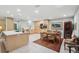 Well-lit kitchen with modern cabinetry, stainless steel appliances, and a breakfast nook at 7094 Fairway Bend Cir # 7094, Sarasota, FL 34243