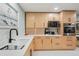 Modern kitchen with sleek countertops and updated appliances at 7094 Fairway Bend Cir # 7094, Sarasota, FL 34243