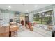 Spacious room with large windows and lots of boxes and storage containers at 7094 Fairway Bend Cir # 7094, Sarasota, FL 34243