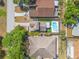 Aerial view of a home featuring a private pool, spa, pergola, and fenced yard at 7134 2Nd N St, St Petersburg, FL 33702