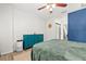 Bright bedroom features a large dresser, ceiling fan, and lots of open space at 7134 2Nd N St, St Petersburg, FL 33702