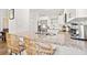 Bright kitchen featuring a granite countertop, stainless steel sink, and breakfast bar at 7134 2Nd N St, St Petersburg, FL 33702