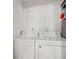 Bright laundry room featuring a white washer and dryer at 7134 2Nd N St, St Petersburg, FL 33702