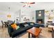 Bright open living space with a fireplace, tile floors and view of the kitchen and dining area at 7134 2Nd N St, St Petersburg, FL 33702
