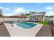 Swimming pool with spa and outdoor lounge area at 7134 2Nd N St, St Petersburg, FL 33702