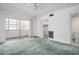 Bedroom with a ceiling fan, closet, bathroom entrance, and sliding glass doors to the outside at 7321 Central Ave # 203, St Petersburg, FL 33710