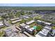 Aerial view of neighborhood with lush greenery and a community pool at 8703 Bardmoor Blvd # 203, Seminole, FL 33777