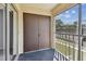 Screened balcony with storage closet offering relaxing views at 8703 Bardmoor Blvd # 203, Seminole, FL 33777
