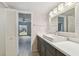 Bathroom featuring a modern sink and vanity with bathtub at 8703 Bardmoor Blvd # 203, Seminole, FL 33777