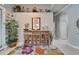 Elegant foyer with stylish decor, high ceilings, and a decorative rug creating a welcoming ambiance at 1102 Emerald Dunes Dr, Sun City Center, FL 33573