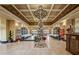 Elegant lobby adorned with festive Christmas decor, including a tree, wreaths, and seasonal displays at 1102 Emerald Dunes Dr, Sun City Center, FL 33573