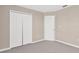 Bedroom with carpeted floor and double-door closet at 1210 Trailwater St, Ruskin, FL 33570