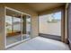 View of screened-in back patio, concrete flooring, access to backyard and natural light at 1210 Trailwater St, Ruskin, FL 33570