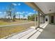 Covered patio with an open view to backyard at 13096 Linzia Ln, Spring Hill, FL 34609