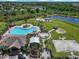 Aerial view of community pool, playground, and recreation area, offering an active outdoor lifestyle at 13821 Kinsale St, Riverview, FL 33579