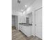 Elegant bathroom featuring double vanity sinks and sleek countertops at 13821 Kinsale St, Riverview, FL 33579