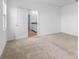 Carpeted bedroom view into the ensuite bathroom at 13821 Kinsale St, Riverview, FL 33579