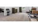 Spacious bonus room with ample space, storage containers, and a view from the window at 13821 Kinsale St, Riverview, FL 33579