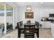 Cozy dining area features an expansive sliding door with a view to the patio and the back yard at 13821 Kinsale St, Riverview, FL 33579