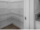 Walk-in pantry features wire shelving for optimal organization and storage at 13821 Kinsale St, Riverview, FL 33579