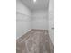 Spacious walk-in closet with carpet flooring and wire shelving for organized storage at 13821 Kinsale St, Riverview, FL 33579