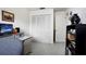 Spare bedroom featuring closet and unique decorative items at 14006 79Th Ave, Seminole, FL 33776