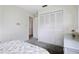 Bright bedroom featuring closet and wicker dresser for ample storage at 14006 79Th Ave, Seminole, FL 33776