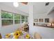 Dining area with natural lighting and adjoins living room at 14006 79Th Ave, Seminole, FL 33776