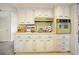 Vintage style kitchen with cabinets, decor and yellow countertops at 14006 79Th Ave, Seminole, FL 33776
