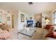 Open-concept living area boasts a neutral color palette, plush seating, and bright natural lighting at 14006 79Th Ave, Seminole, FL 33776
