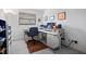 Bright office space with large window, desk, chair and shelving at 14006 79Th Ave, Seminole, FL 33776
