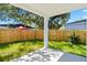 Spacious backyard with a covered patio, providing an ideal spot for relaxing and entertaining at 1432 19Th S St, St Petersburg, FL 33712