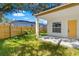 The backyard features a well-maintained lawn and a privacy fence, offering a serene outdoor space at 1432 19Th S St, St Petersburg, FL 33712