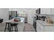 Updated kitchen features granite countertops, stainless appliances, and a convenient island with breakfast bar at 1432 19Th S St, St Petersburg, FL 33712