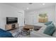 Bright living room featuring modern furniture, hardwood floors, and neutral paint at 1432 19Th S St, St Petersburg, FL 33712