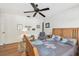Relaxing bedroom with hardwood floors, dark ceilings, and warm decor at 14344 83Rd Pl, Seminole, FL 33776